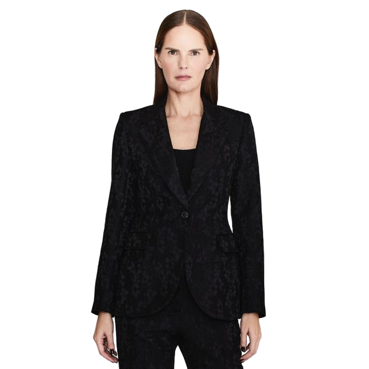 Woman wearing a black suit on a white background